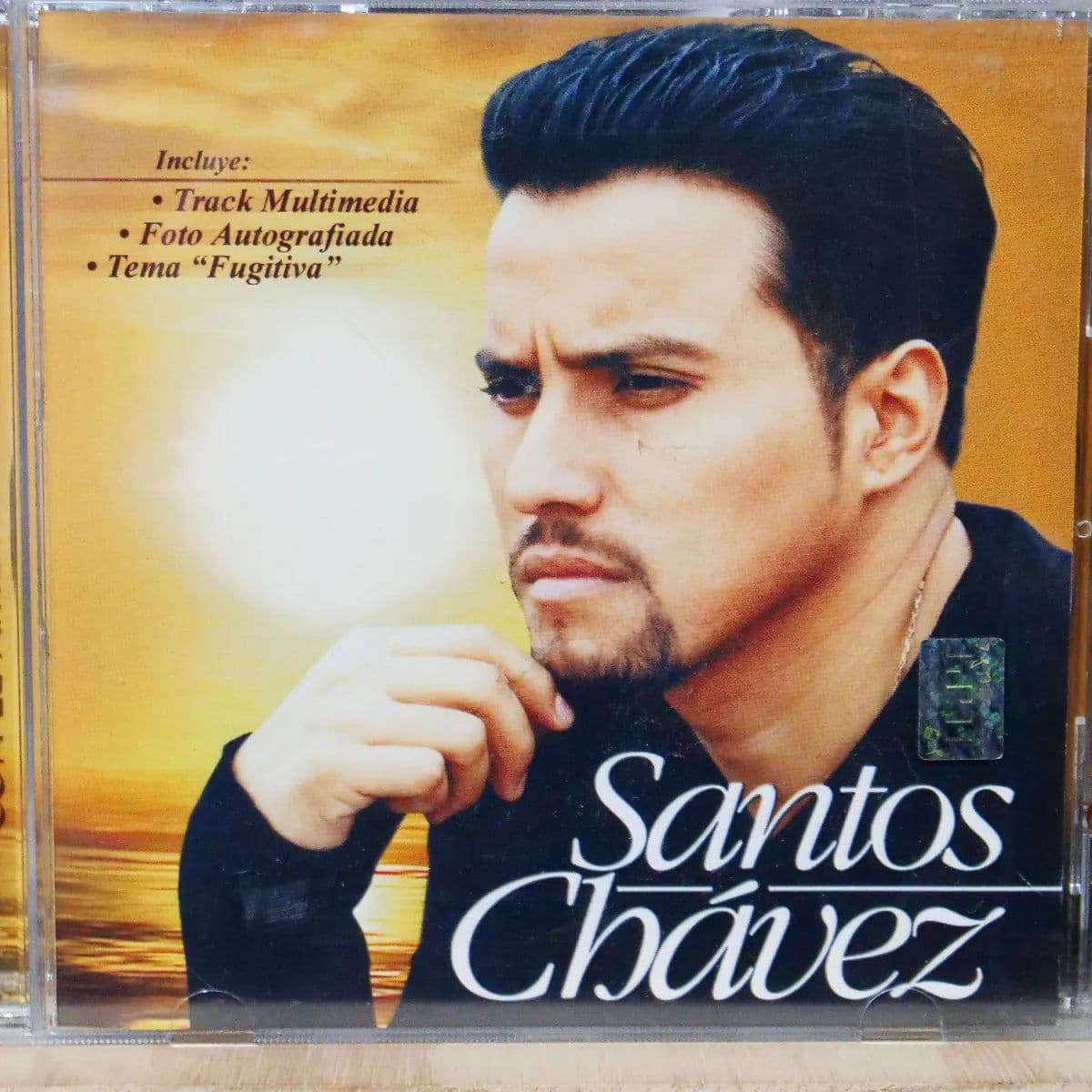 Santos Chávez – Con el Amor No Se Juega (CD Album usado VG+) - Miniatura 1 en LEMM DJ Store