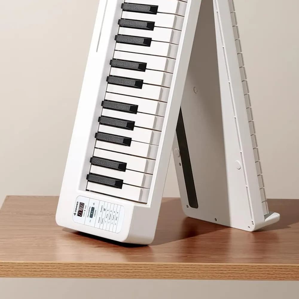 Donner DP-06 – Teclado Plegable de 61 Teclas Semi-Pesadas con Bluetooth, Batería y Pedal