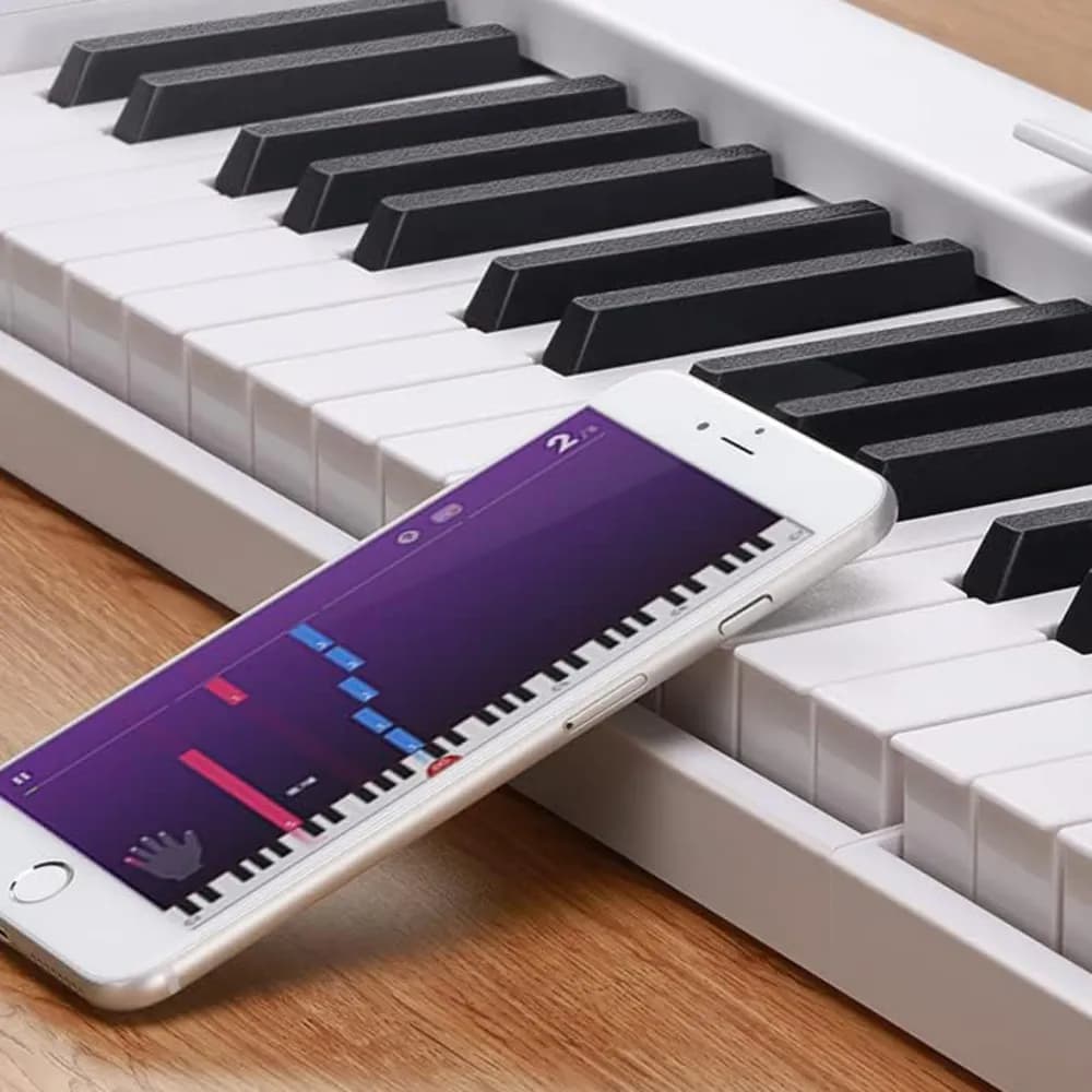Donner DP-06 – Teclado Plegable de 61 Teclas Semi-Pesadas con Bluetooth, Batería y Pedal